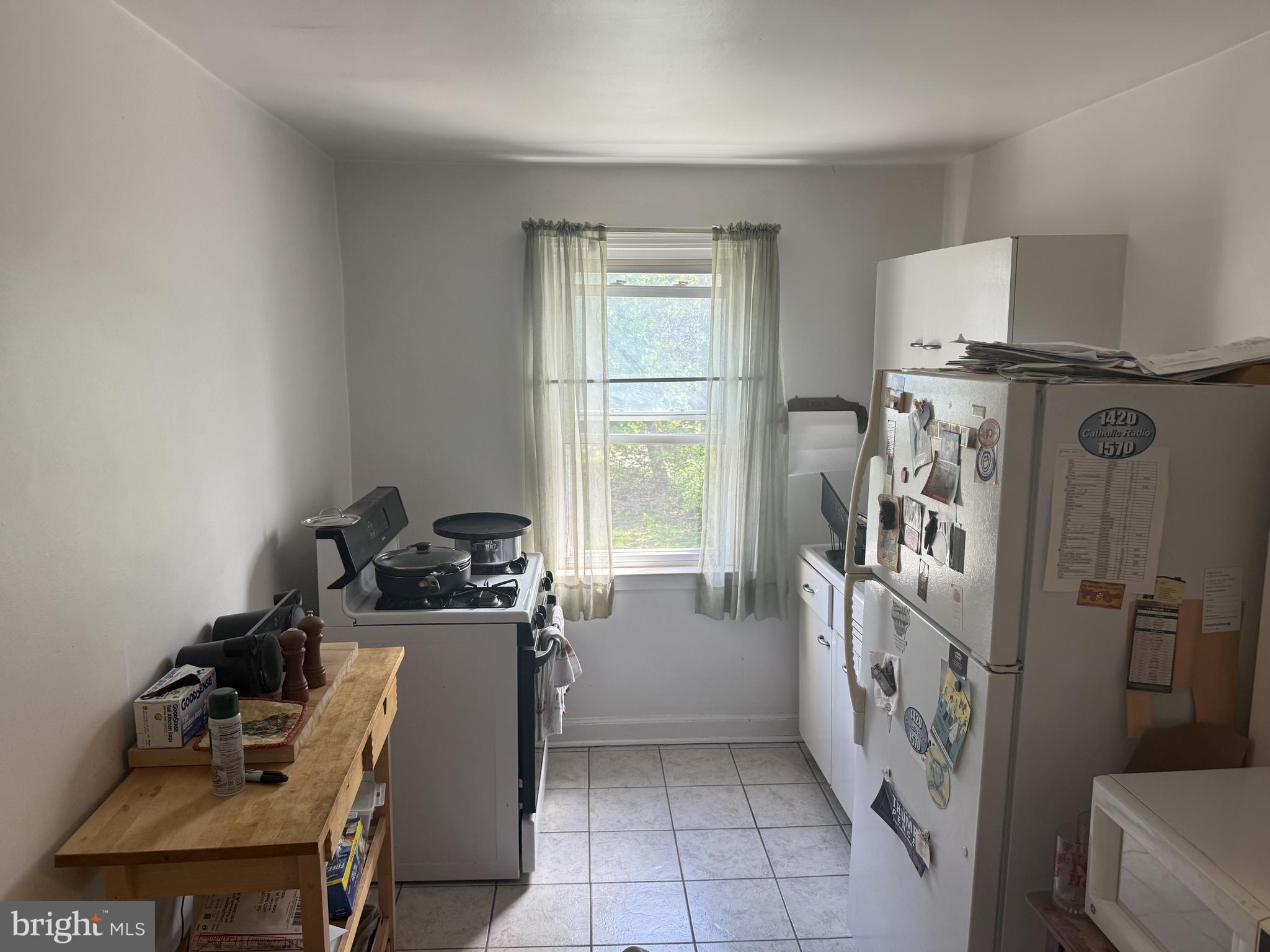 2203 Steele Road Drexel Hill, PA 19026 - Photo 5 of 14 a storage room with a washer and dryer