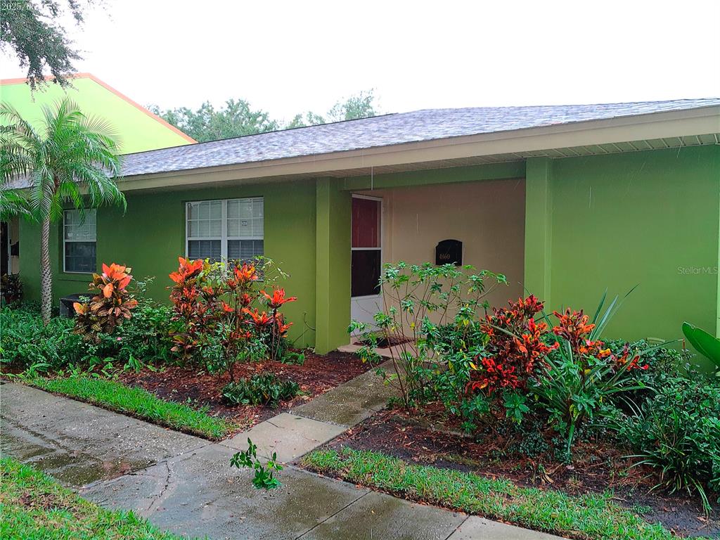 a front view of a house with yellow lighting