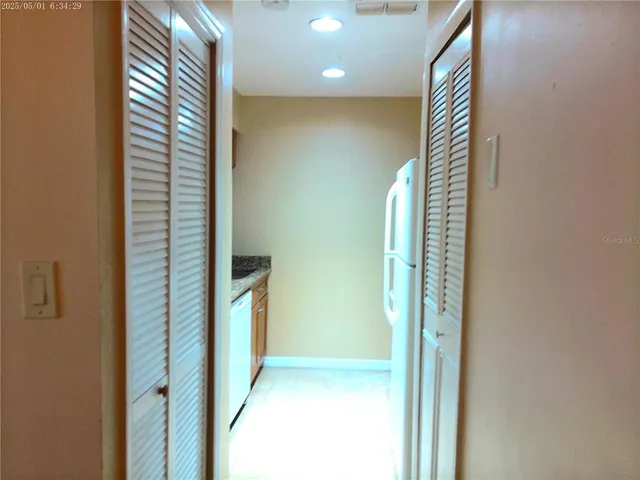 a view of hallway with stairs