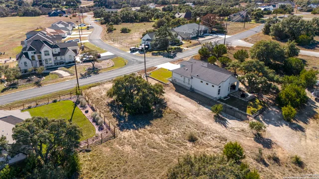 a view of a houses with a swimming pool