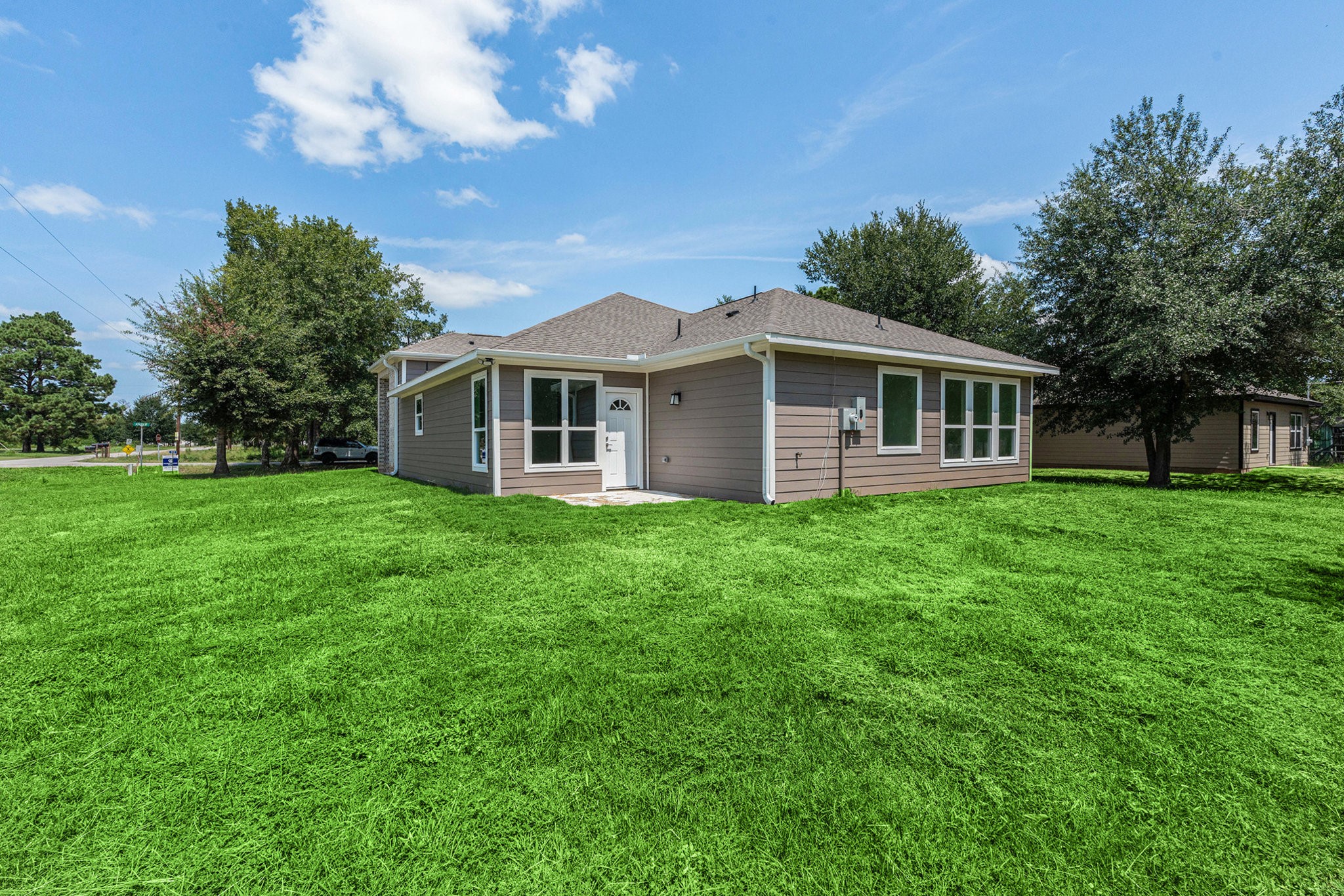 702 Azalea Street Waller, TX 77484 - Photo 4 of 45 a view of house with a big yard