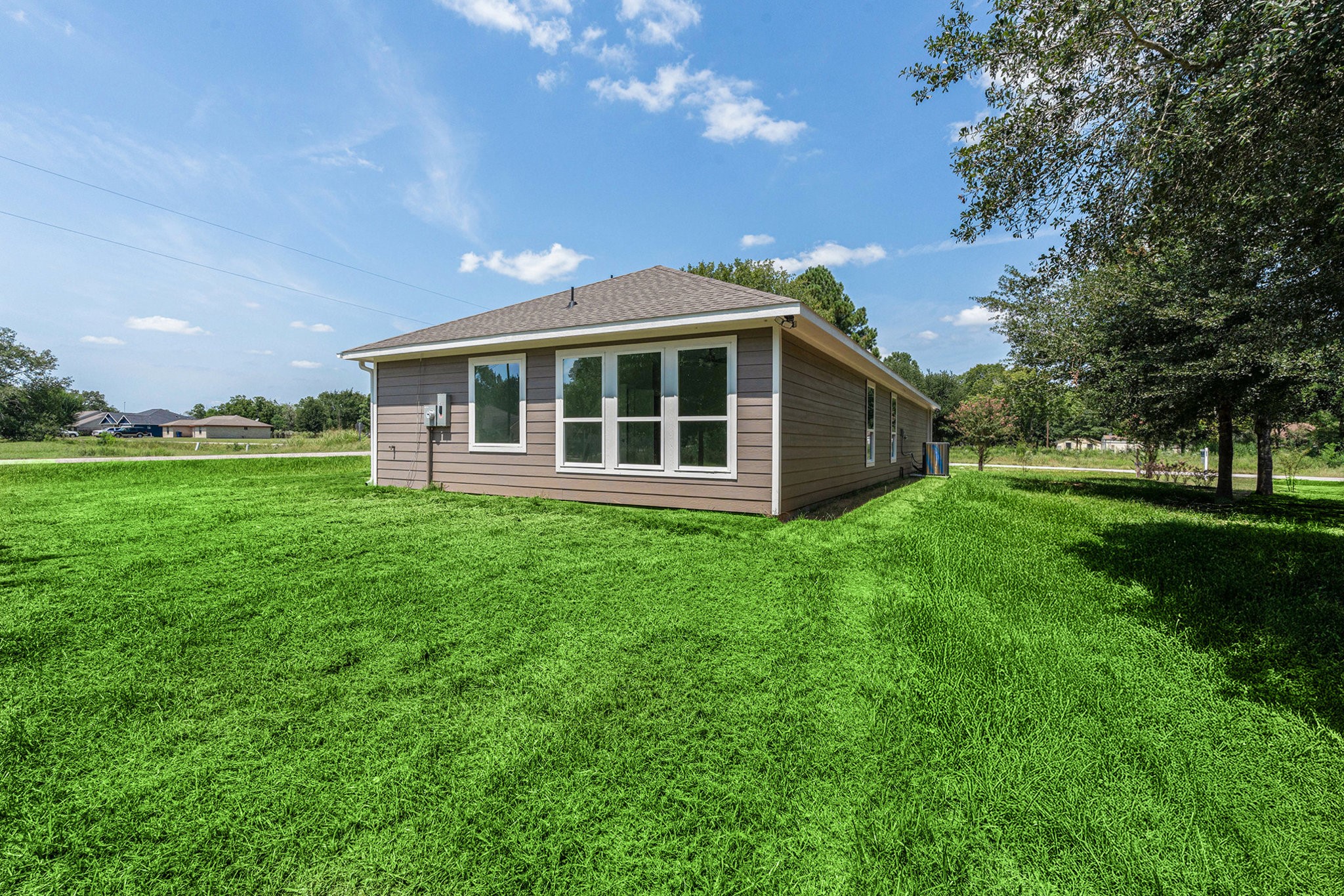 702 Azalea Street Waller, TX 77484 - Photo 42 of 45 a view of a house with yard and sitting area
