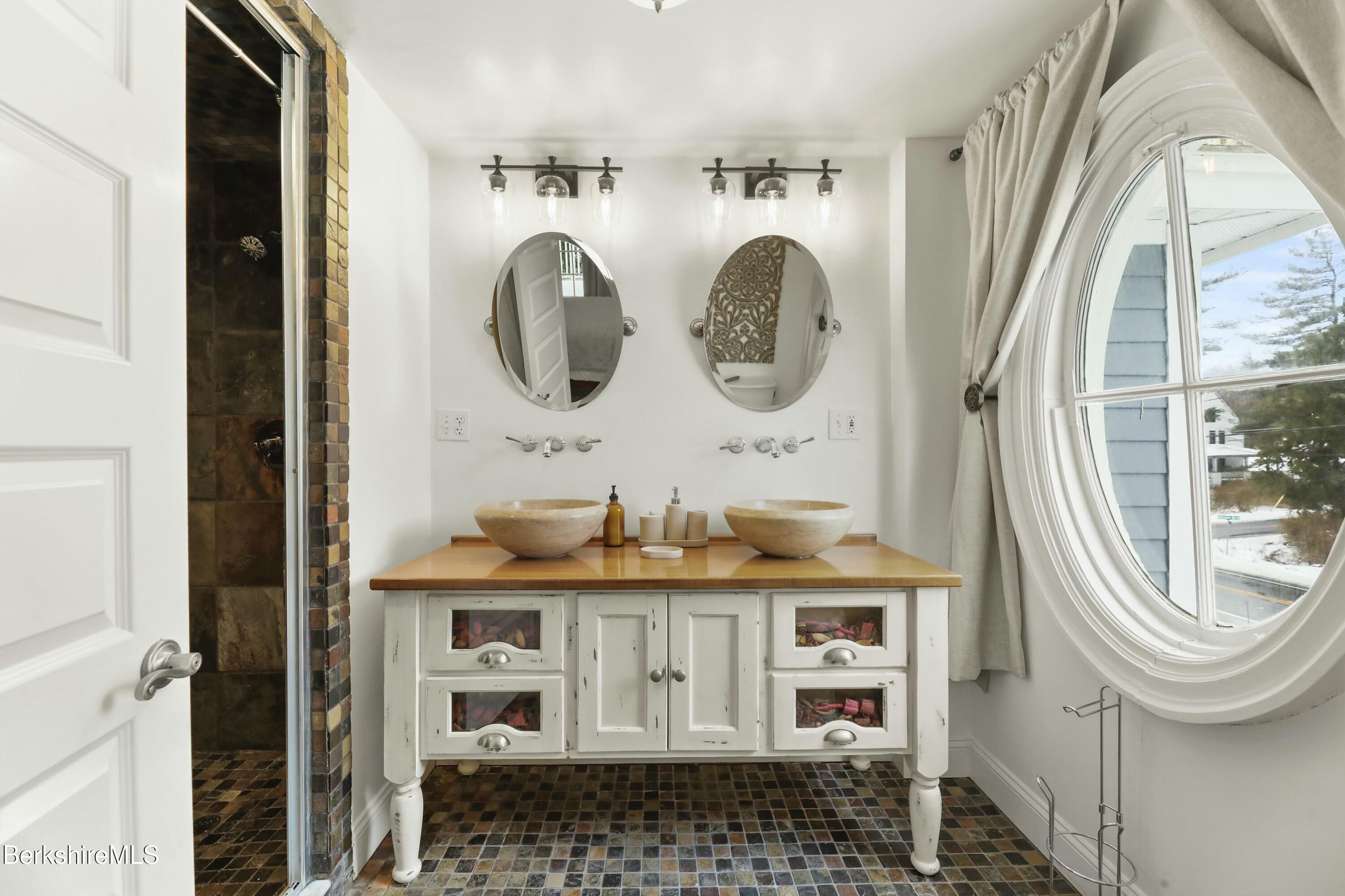 1 Devon Road Stockbridge, MA 01262 - Photo 20 of 45 a bathroom with a granite countertop sink and a mirror