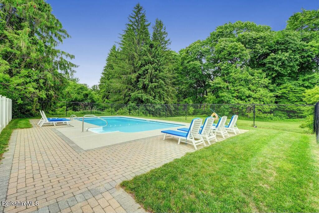 1 Devon Road Stockbridge, MA 01262 - Photo 2 of 45 a view of a swimming pool with a yard