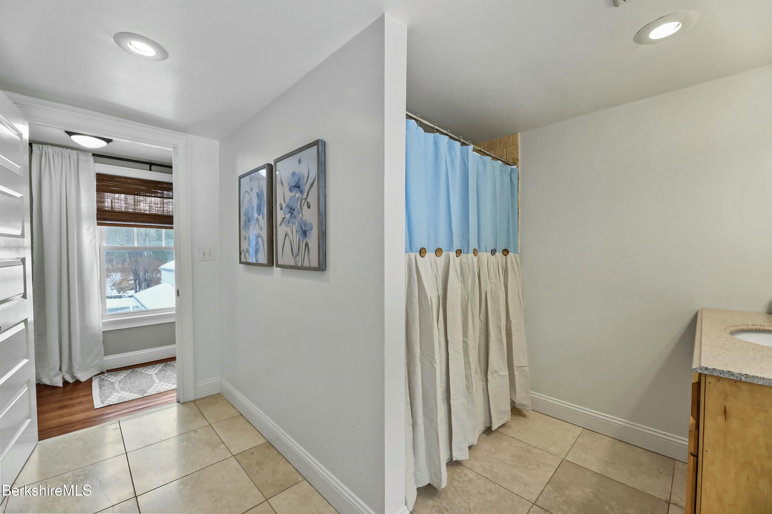 1 Devon Road Stockbridge, MA 01262 - Photo 26 of 45 a view of a hallway with bathroom