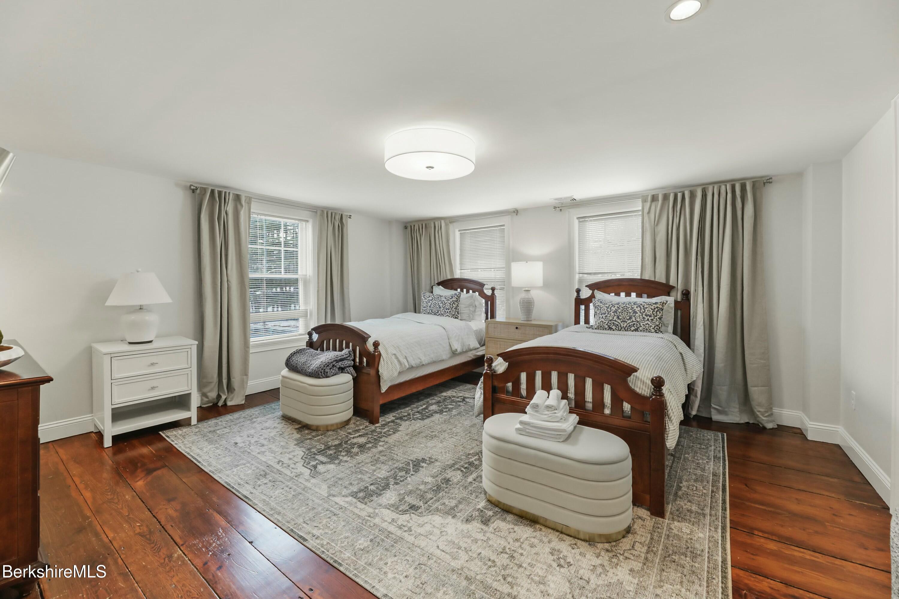 1 Devon Road Stockbridge, MA 01262 - Photo 33 of 45 a bedroom with bed and wooden floor