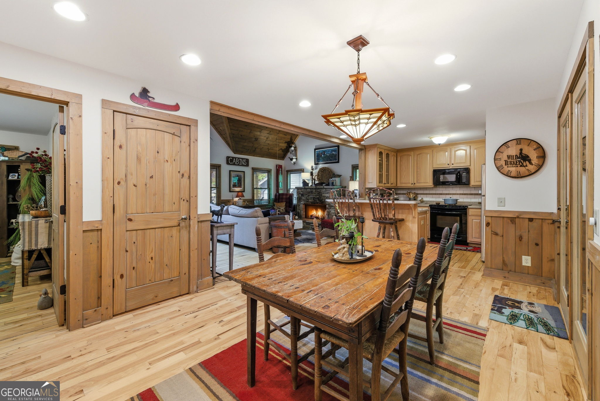 634 Little Hawk Road Sautee Nacoochee, GA 30571 - Photo 11 of 54 a view of a dining area with furniture and wooden floor
