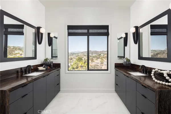 a kitchen with a sink and a window