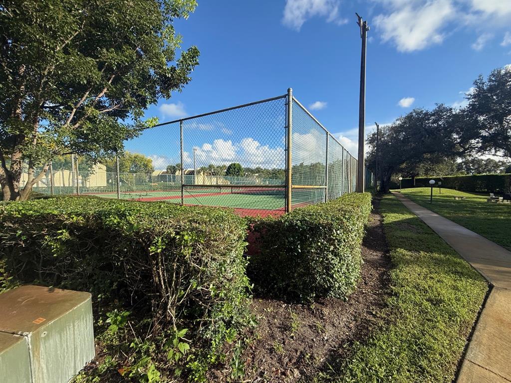 2935 Southwest 22nd Avenue, Unit 2050 Delray Beach, FL 33445 - Photo 5 of 5 a view of a back yard