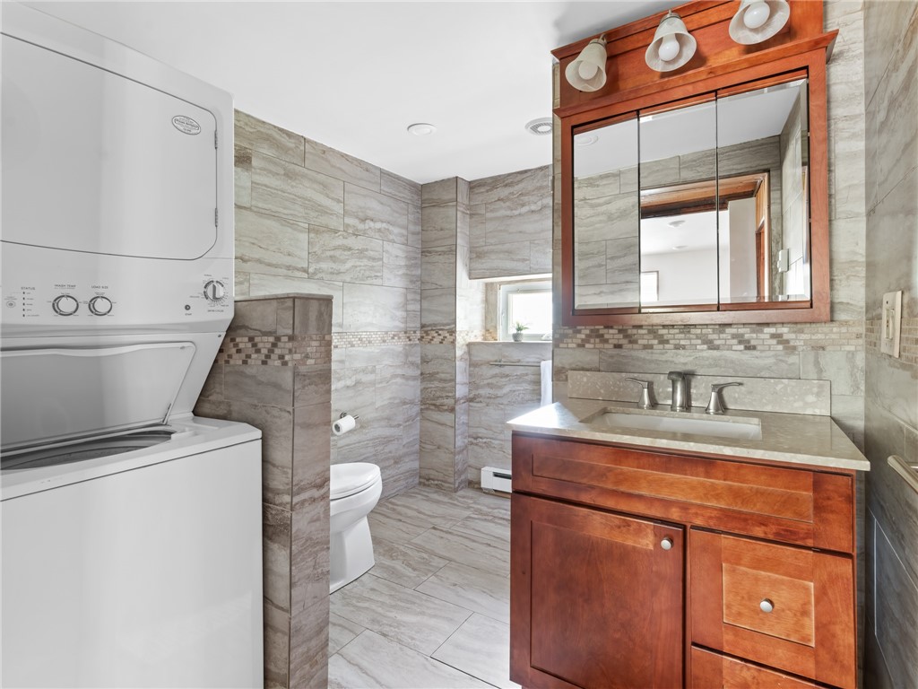 182 Acres Of Pine Road Coventry, RI 02816 - Photo 12 of 29 Bathroom with laundry