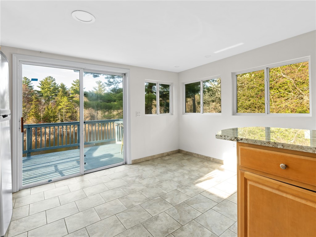 182 Acres Of Pine Road Coventry, RI 02816 - Photo 15 of 29 Sliding glass door to deck