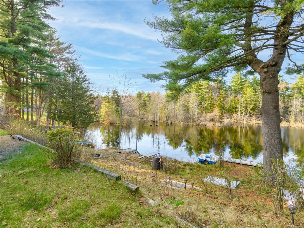 182 Acres Of Pine Road Coventry, RI 02816 - Photo 20 of 29 Grounds with firepit and dock access