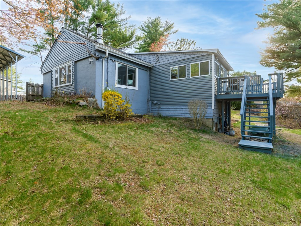 182 Acres Of Pine Road Coventry, RI 02816 - Photo 3 of 29 Side yard and deck