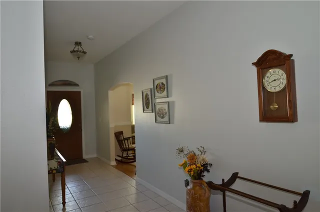 a view of a hallway with entryway