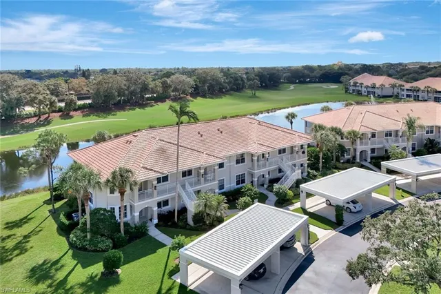 a view of a building with a yard