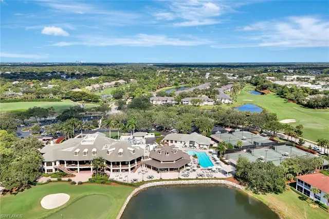 a view of a swimming pool with lounge chair