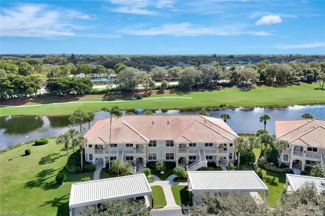 an aerial view of a house with outdoor space