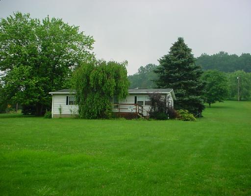 Exterior Front. Mostly level yard,approximately 1.7 acres