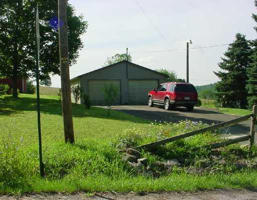 Parking Lot/Garage. The 2 car detached garage has elec. and Paved driveway