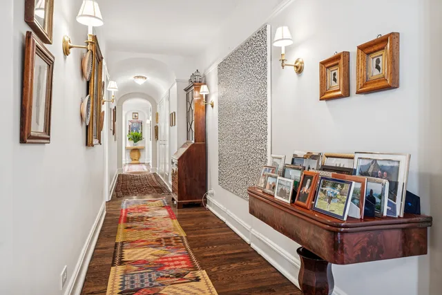 a living room with furniture and a rug