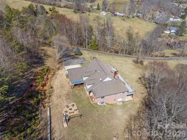 an aerial view of residential house with outdoor space