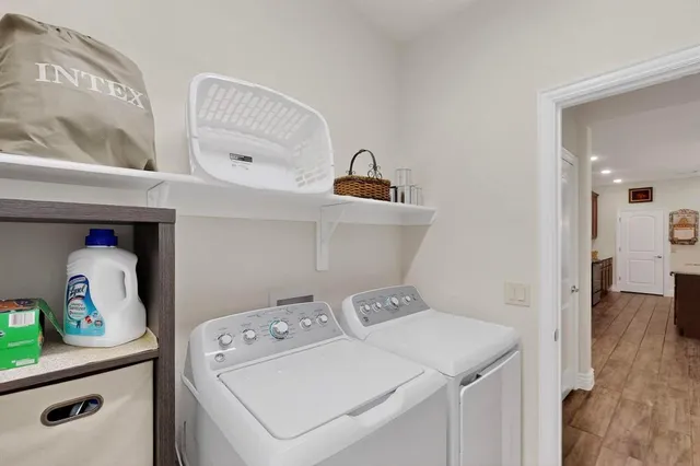 a utility room with dryer and washer