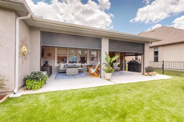 a view of a house with patio