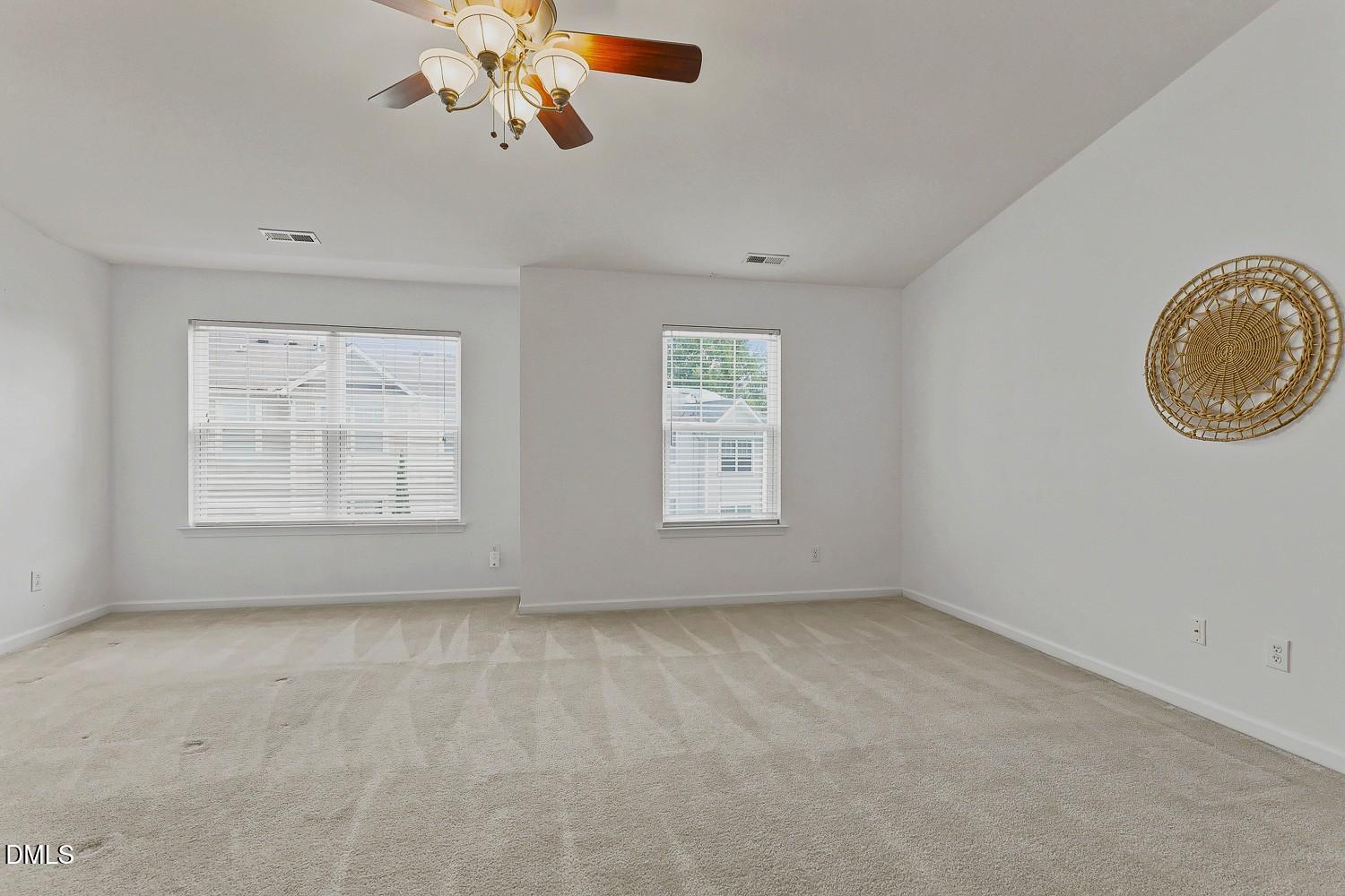 8620 Neuse Club Lane, Unit 107 Raleigh, NC 27616 - Photo 18 of 33 018-015-Primary Bedroom-1500x1000