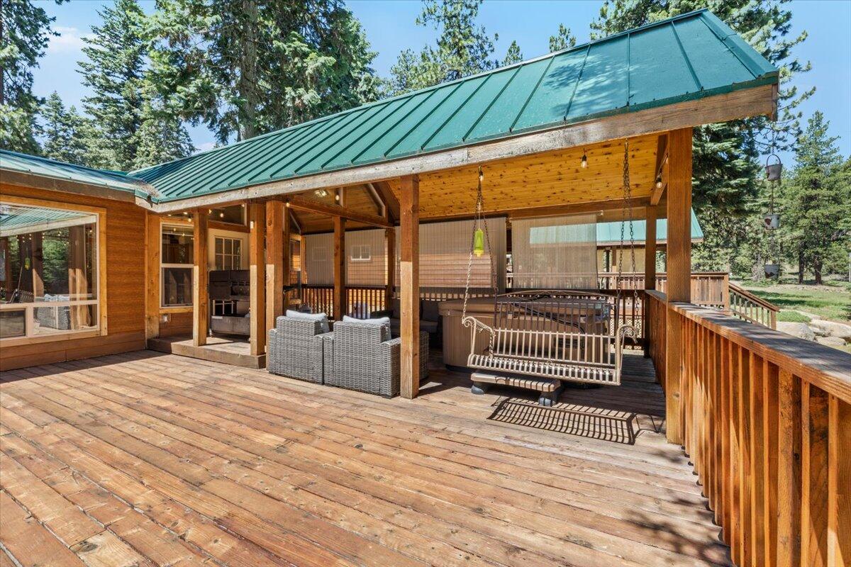 7979 Hyatt Prairie Road, Unit 32 Ashland, OR 97520 - Photo 7 of 38 Part of the deck is covered - seating and hot tub is included.
