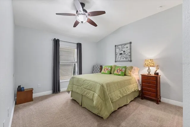 a bathroom with a sink toilet a mirror and shower