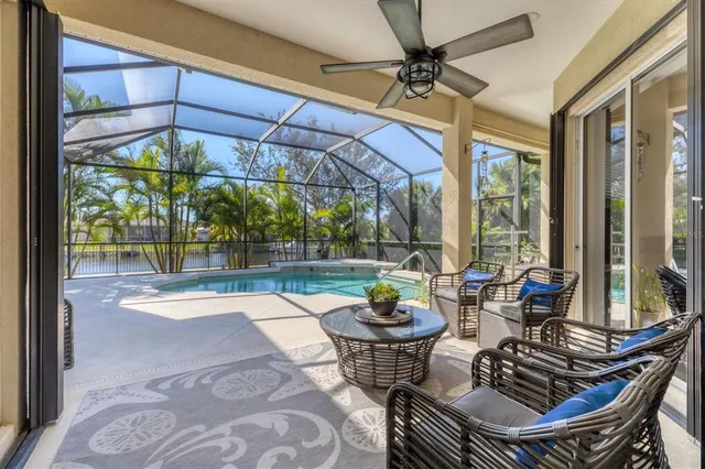a view of a yard with wooden fence