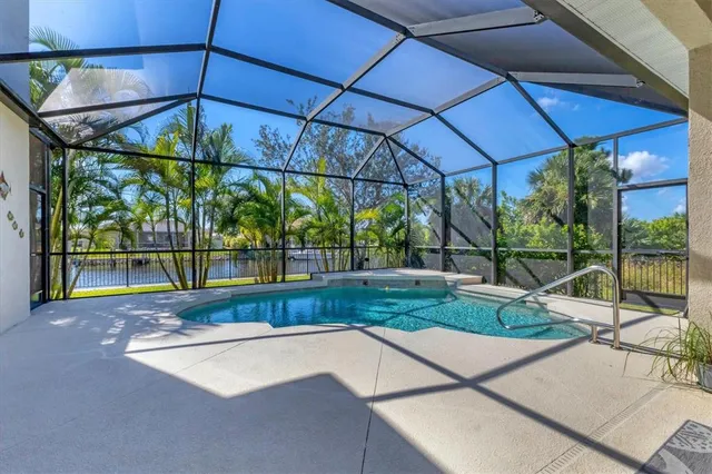 a view of a backyard with a garden and trees
