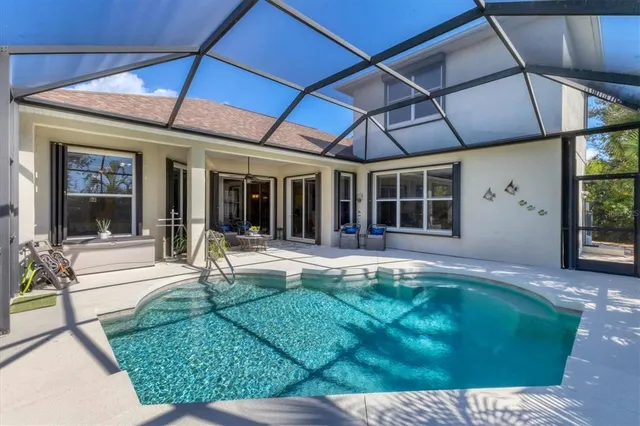 a view of a house with a yard from a balcony