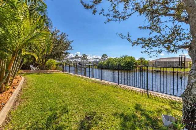 a view of swimming pool with a lake view