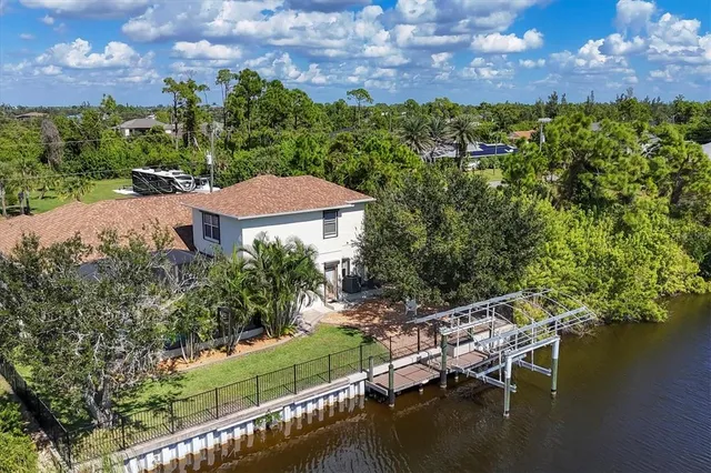a view of a swimming pool with an ocean view