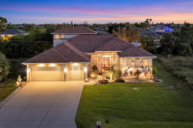 a front view of a house with a yard