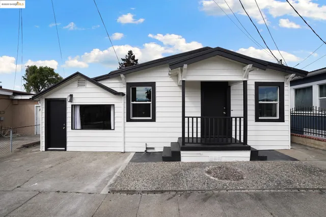 a front view of a house with a garage