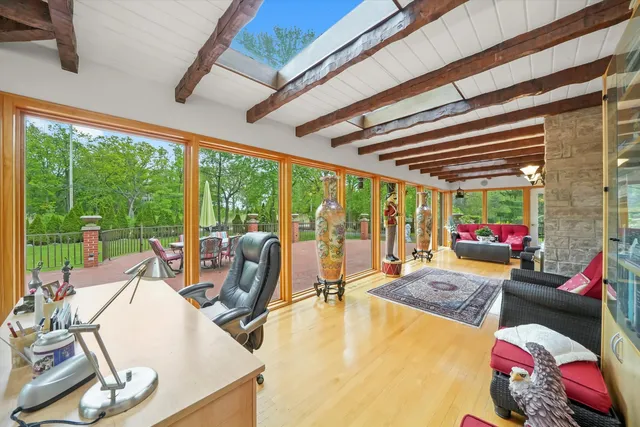 a room with furniture and a large window