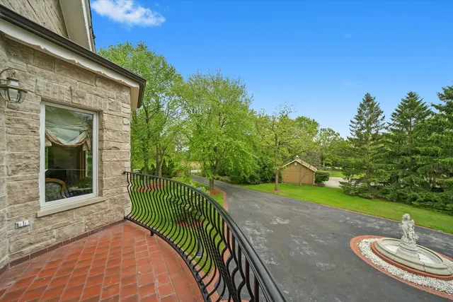 a view of a balcony with an outdoor space