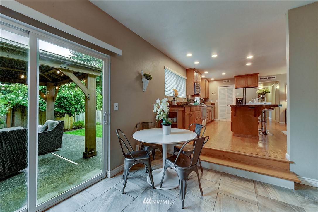 110 219th Place Southeast Bothell, WA 98021 - Photo 14 of 27 a view of a dining room with furniture window and outside view