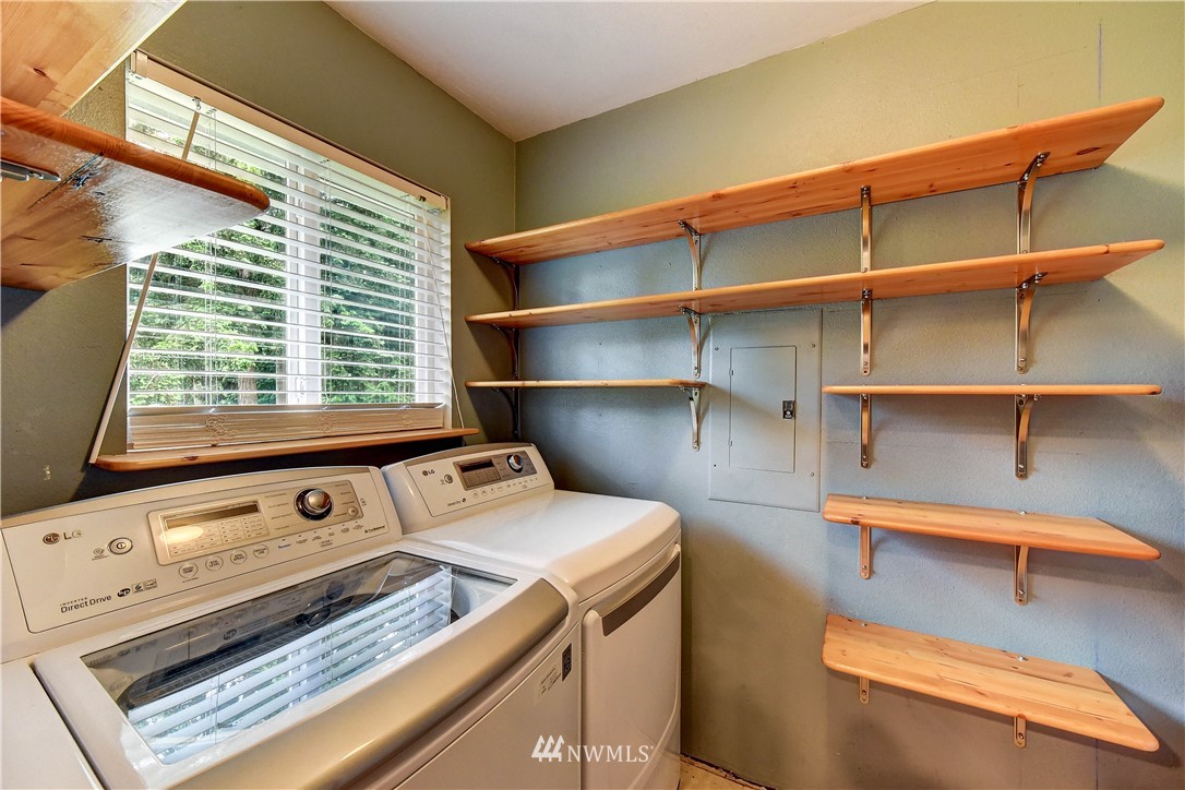 110 219th Place Southeast Bothell, WA 98021 - Photo 23 of 27 a utility room with dryer and washer