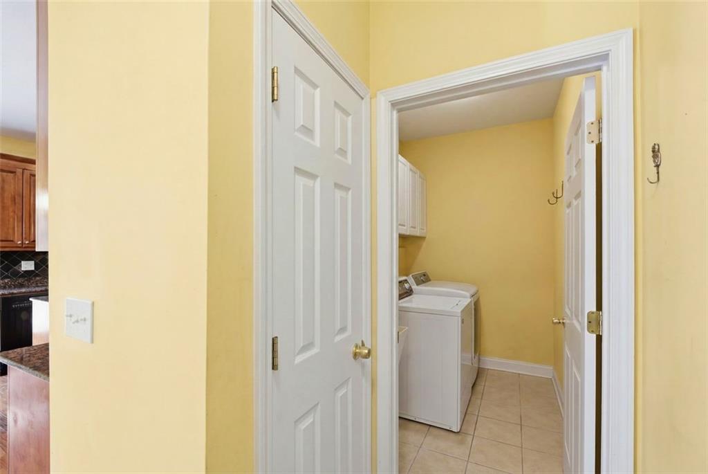 3420 Bulloch Lake Road Loganville, GA 30052 - Photo 26 of 57 a bathroom with a sink and a mirror