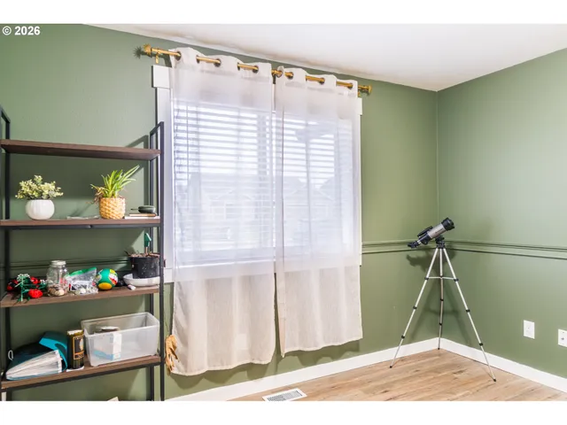 a utility room with sink dryer and washer