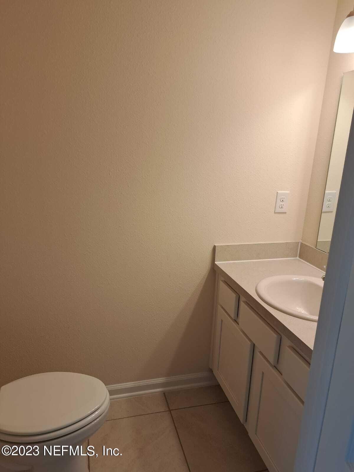 7859 Echo Springs Road Jacksonville, FL 32256 - Photo 13 of 19 half bath