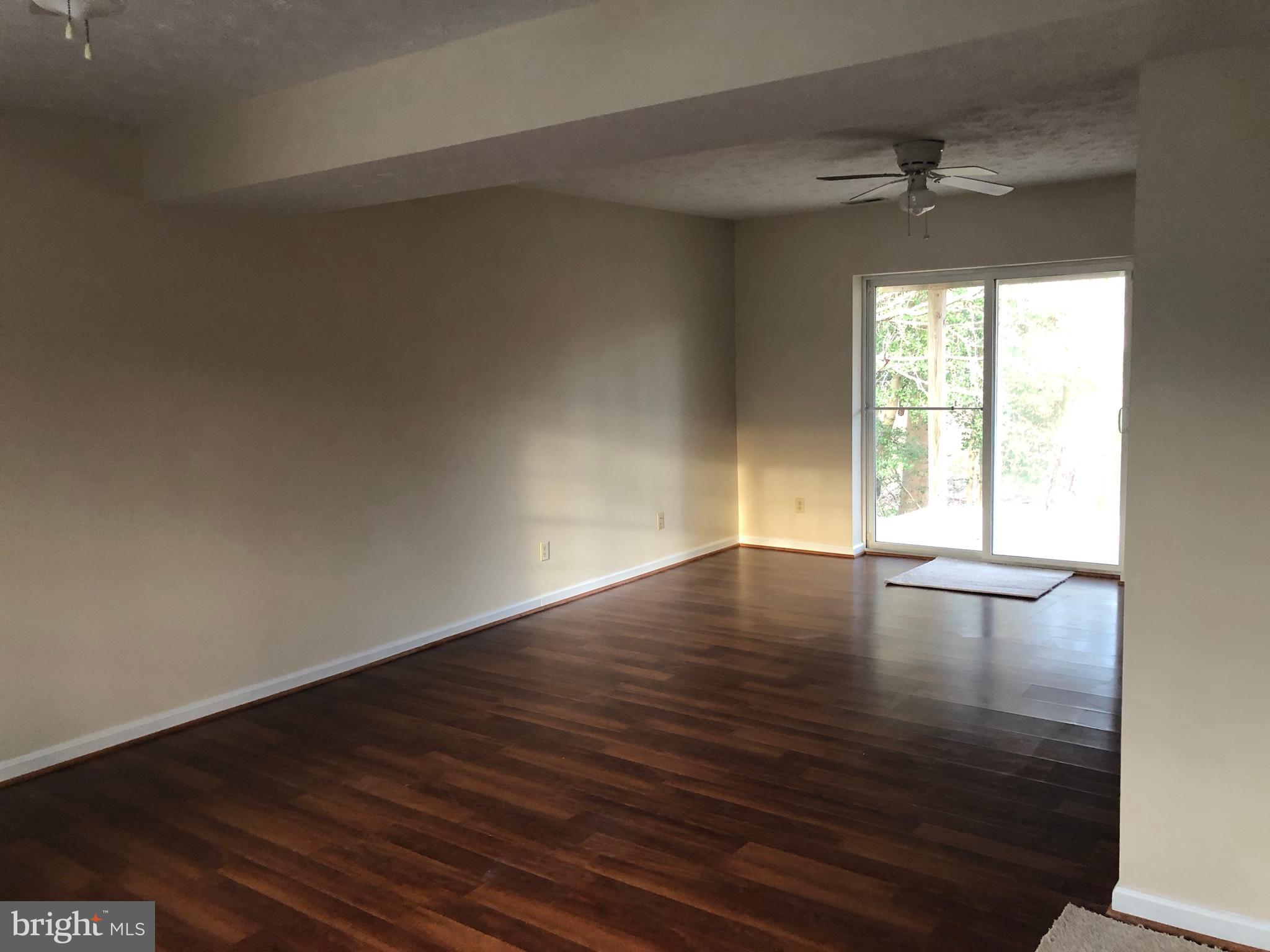 11224 Rawhide Road Lusby, MD 20657 - Photo 12 of 18 Walk-out Finished Rec Room