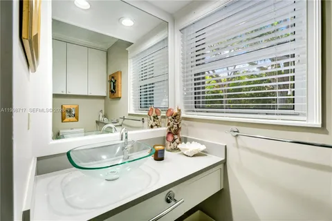 an aerial view of a house with yard swimming pool and outdoor seating