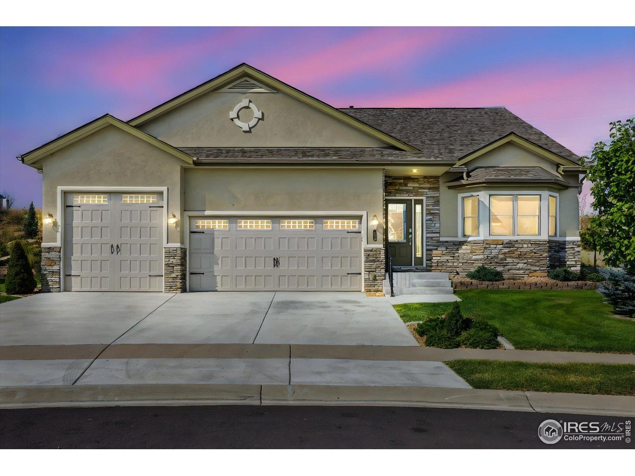 403 Double Tree Drive Greeley, CO 80634 - Photo 1 of 49 a front view of a house with a yard and garage