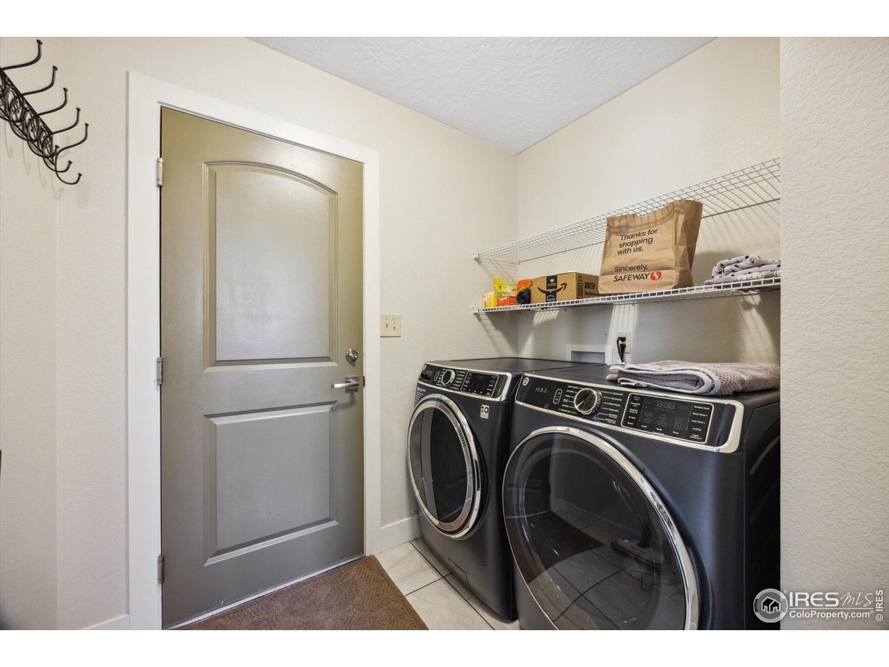 403 Double Tree Drive Greeley, CO 80634 - Photo 20 of 49 a utility room with dryer and washer
