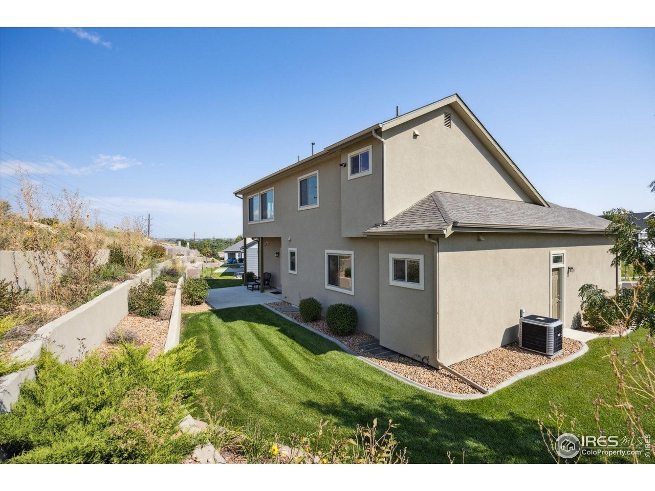 403 Double Tree Drive Greeley, CO 80634 - Photo 39 of 49 a view of a house with backyard and porch