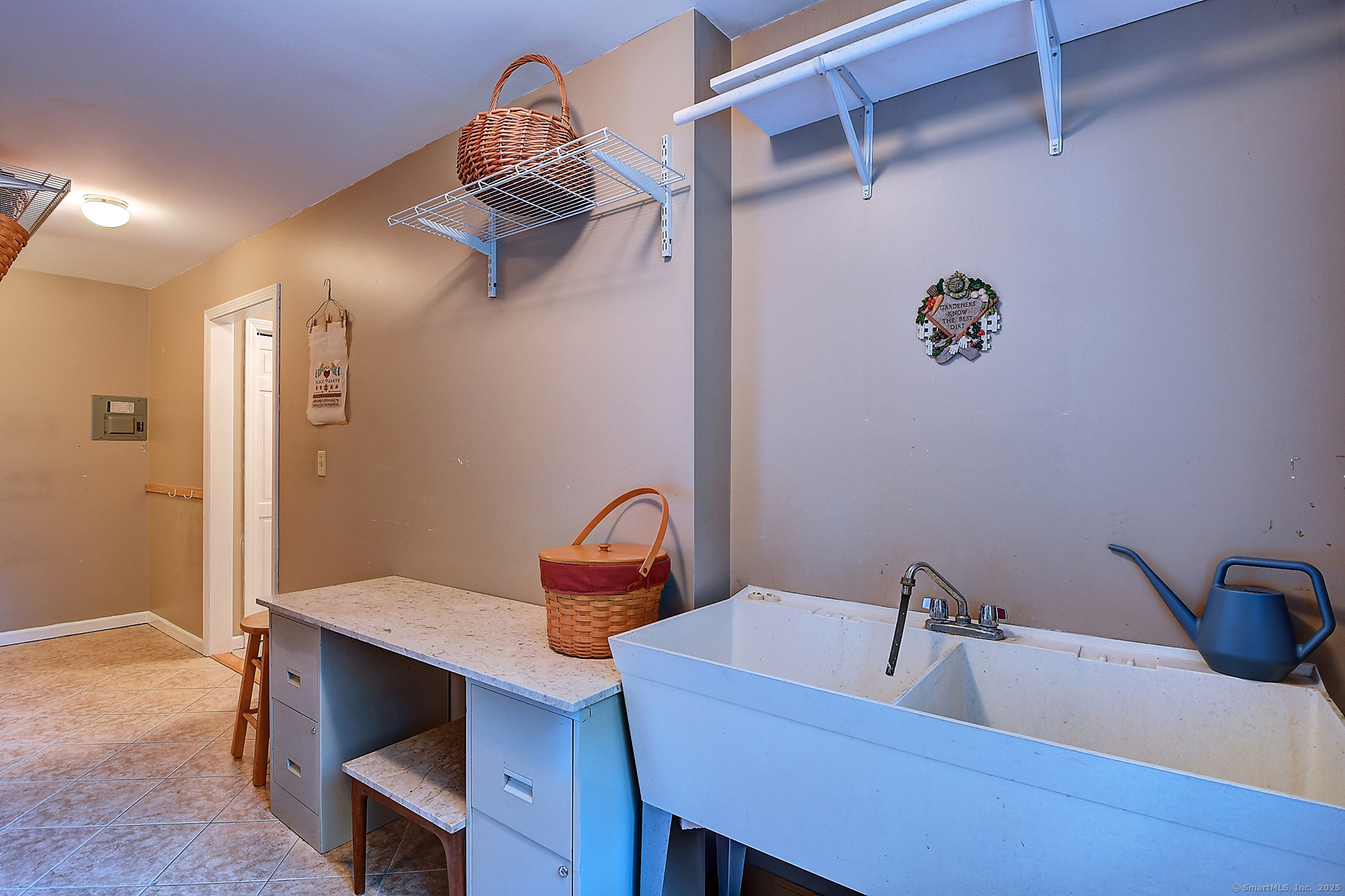 884 Moss Farms Road Cheshire, CT 06410 - Photo 20 of 39 a room with a table chairs and wooden floor